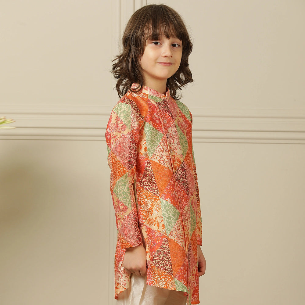 
                  
                    The kurta features a straight, comfortable silhouette with a soft sheen, making it ideal for long hours of celebration without compromising on style.
                  
                