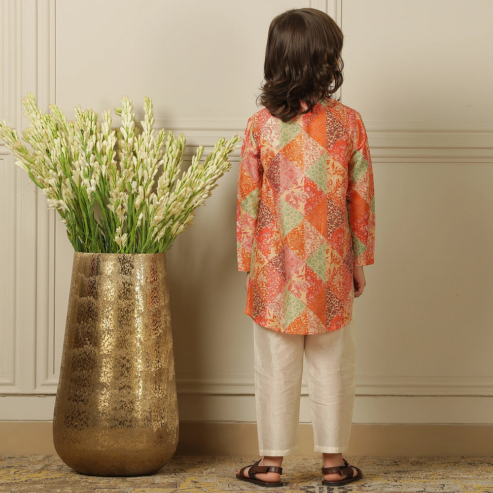 
                  
                    The kurta features a straight, comfortable silhouette with a soft sheen, making it ideal for long hours of celebration without compromising on style.
                  
                