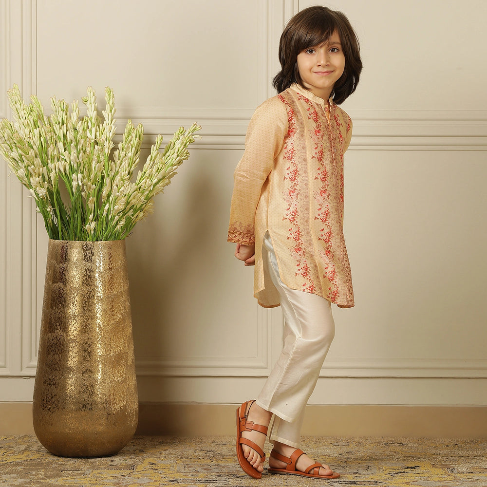 
                  
                    The kurta is lightweight and breezy, designed with a straight cut for a classic fit that keeps your little one comfortable all day.
                  
                