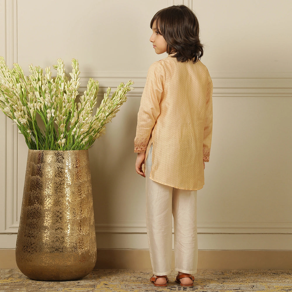 
                  
                    The kurta is lightweight and breezy, designed with a straight cut for a classic fit that keeps your little one comfortable all day.
                  
                
