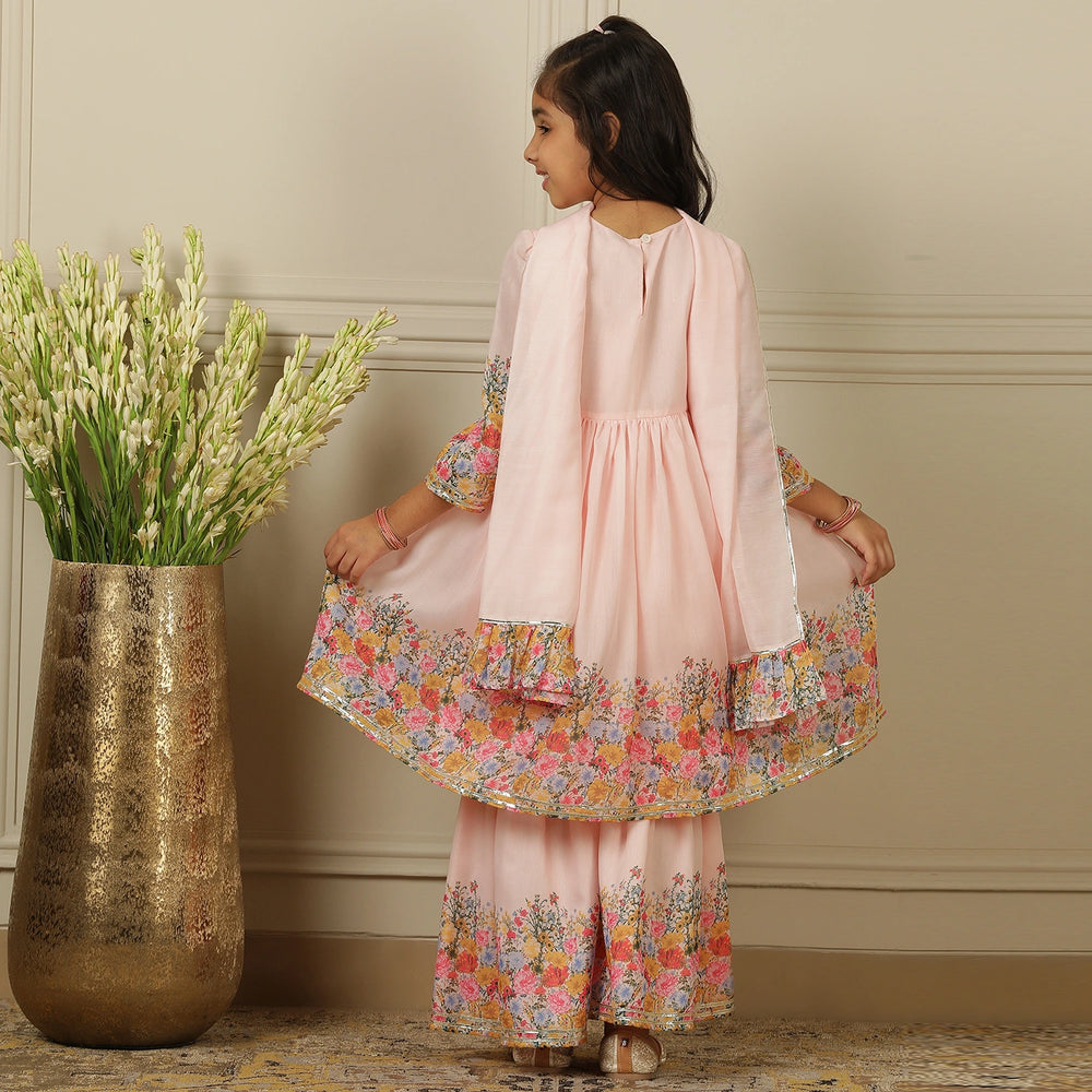 
                  
                    full-length three piece set features intricate embroidered detailing on the back and hemline, along with a beautiful dupatta to complete the look
                  
                